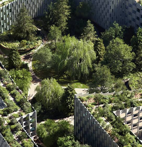 Vista aérea de masterplan residencial com edifícios de concreto entre vegetação densa, alamedas arborizadas e áreas verdes internas.